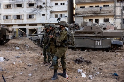Israeli soldiers stand amid the rubble, during the ongoing ground invasion against Palestinian Islamist group Hamas in the northern Gaza Strip, November 8, 2023. REUTERS/Ronen Zvulun EDITOR’S NOTE: REUTERS PHOTOGRAPHS WERE REVIEWED BY THE IDF AS PART OF THE CONDITIONS OF THE EMBED. NO PHOTOS WERE REMOVED.