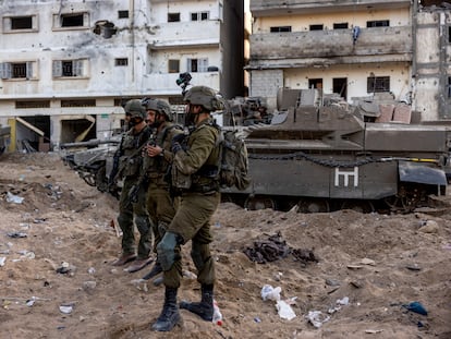 Israeli soldiers stand amid the rubble, during the ongoing ground invasion against Palestinian Islamist group Hamas in the northern Gaza Strip, November 8, 2023. REUTERS/Ronen Zvulun EDITOR’S NOTE: REUTERS PHOTOGRAPHS WERE REVIEWED BY THE IDF AS PART OF THE CONDITIONS OF THE EMBED. NO PHOTOS WERE REMOVED.