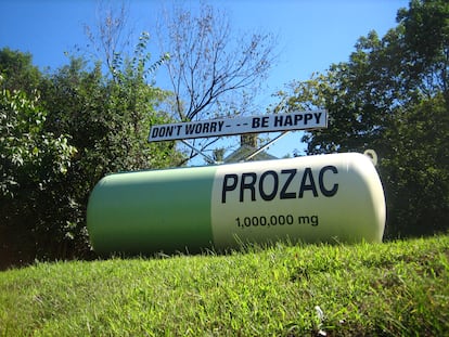 An advertisement for Prozac reads 'Don't worry, be happy', in New York, in an undated image.