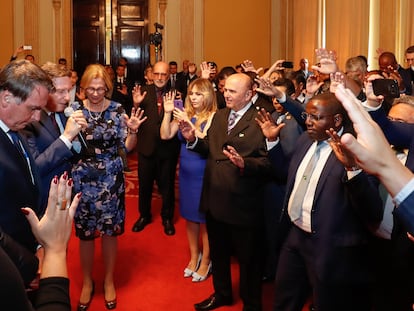 O presidente Jair Bolsonaro participa de oração coletiva conduzida pelo prefeito do Rio de Janeiro, Marcelo Crivella, em 20 de janeiro de 2020.