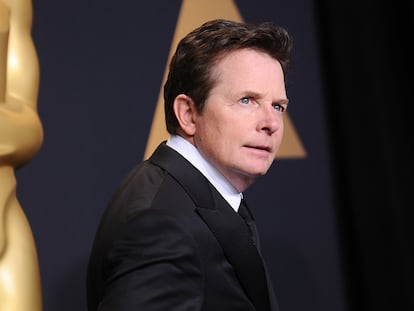 Actor Michael J. Fox poses in the press room at the 89th annual Academy Awards