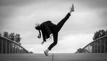 Side View Full Length Of Woman Dancing On Footbridge