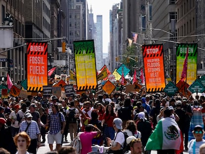 Climate activists march on Madison Avenue while protesting energy policy and the use of fossil fuels, in New York, Sunday, Sept. 17, 2023.