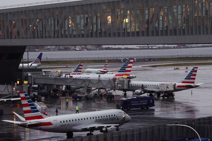 American Airlines planes are seen at gates at LaGuardia Airport ahead of the Thanksgiving holiday, in New York City, U.S., November 21, 2023.