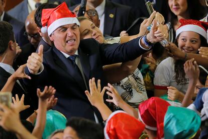 O presidente Bolsonaro participa de cerimônia de Natal no Palácio do Planalto, no dia 19.