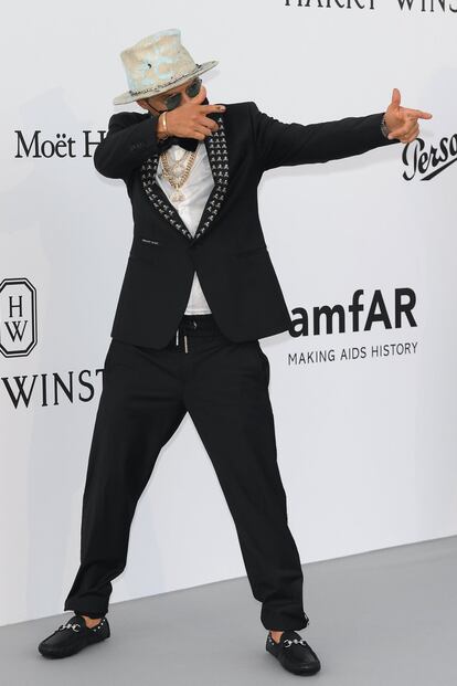 Alec Monopoly llega a la gala AmfAR de Cannes.