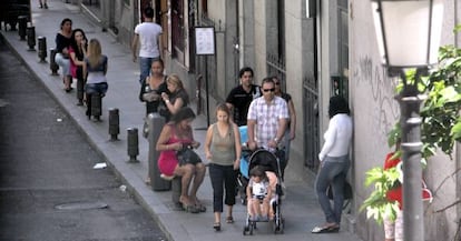 Sex workers wait for clients on Madrid&#039;s downtown Montera street.