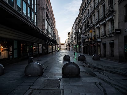 Preciados street in Madrid, normally packed with shoppers and tourists, deserted under the lockdown.