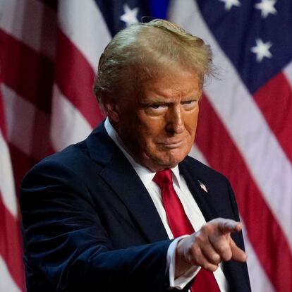 Republican presidential nominee former President Donald Trump points to the crowd at an election night watch party, Wednesday, Nov. 6, 2024, in West Palm Beach, Fla. (AP Photo/Julia Demaree Nikhinson)