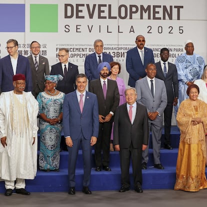 Spain's Prime Minister Pedro Sanchez, center, next to United Nations Secretary-General Antonio Guterres, pose for a photo with nation leaders and representatives, at the start of the four-day Financing for Development meeting in Seville,