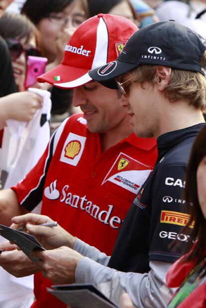Alonso, con Vettel en china.
