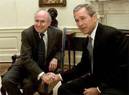 El primer ministro australiano, Howard (izquierda), junto al presidente estadounidense, Bush.