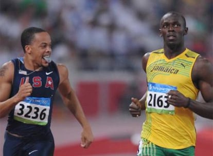 Usain Bolt, a la derecha, junto al estadounidense Wallace Spearmon en la segunda semifinal de los 200 metros.