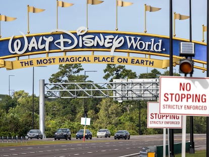 Cars pass under one of the Walt Disney World gateways in Kissimmee, Florida, USA, 03 November 2023.