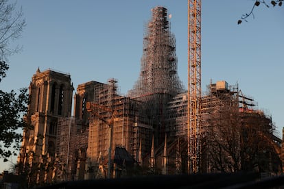 High scaffolding and the framework of the new spire of the Notre-Dame cathedral stand, as restoration works continue, in Paris, France December 2, 2023.