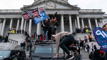 supporters of former president Donald Trump protest outside the U.S. Capitol in Washington, DC.