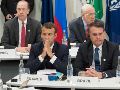 O presidente francês, Emmanuel Macron, junto a seu homólogo brasileiro, Jair Bolsonaro, no G20 de Osaka, nesta sexta-feira.