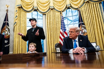 Elon Musk and his son X Æ A-Xii, in the Oval Office, with Donald Trump, on February 11, 2025.