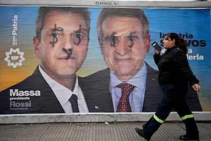 An election campaign banner of running presidential contender Sergio Massa, the current minister of economy, and his running mate Agustin Rossi covers a wall on a street in Buenos Aires, Argentina, Wednesday, August 9, 2023.