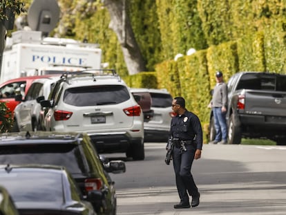 Police officers on a street as federal investigators conduct a raid of a home owned by rapper and record producer Sean 'Diddy' Combs in Los Angeles, California, USA, 25 March 2024.