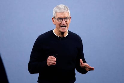 FILE PHOTO: CEO Tim Cook speaks at an Apple event at their headquarters in Cupertino