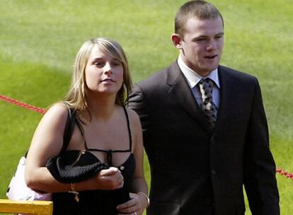Rooney y su novia, Coleen.