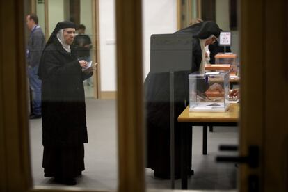 Two nuns vote at a polling station in Madrid.