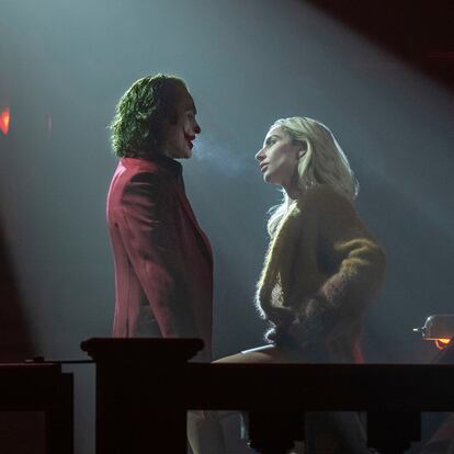 This image released by Warner Bros. Pictures shows Joaquin Phoenix, left, and Lady Gaga in a scene from "Joker: Folie à Deux." (Niko Tavernise/Warner Bros. Pictures via AP)