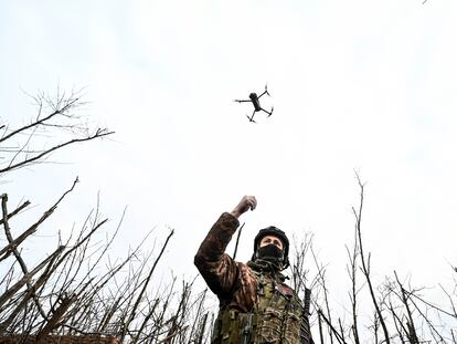 A Ukrainian soldier activates a drone on February 12 near the municipality of Robotyne in the Zaporizhzhia region.