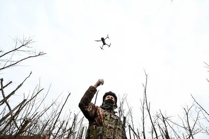 A Ukrainian soldier activates a drone on February 12 near the municipality of Robotyne in the Zaporizhzhia region.