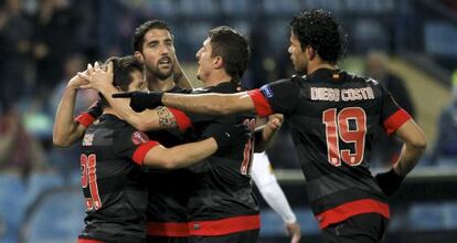 Atletico players (left to right) Emre, Ra&uacute;l Garc&iacute;a, Cebolla Rodr&iacute;guez and Diego Costa celebrate a Europa League goal against Hapoel Tel Aviv. 