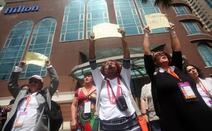 Several women protest last month over the court's decision outside a Santo Domingo hotel where a regional women's conference took place.
