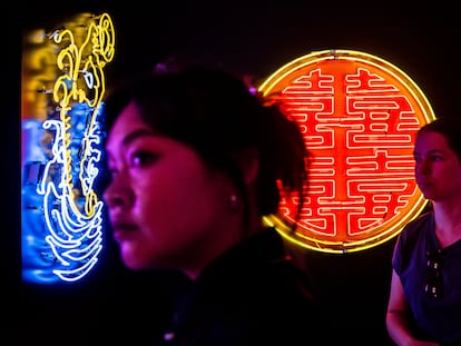 Visitors at the neon exhibition at the Tai Kwun complex in Hong Kong, on July 5, 2023.