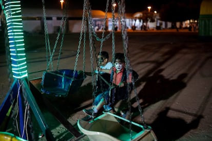 Crianças jogam em um parque aberto recentemente, o 12 de setembro de 2018, em Damasco.