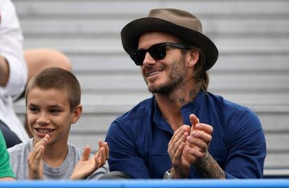 Romeo y David Beckham, en Queen Club.