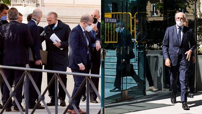 El expresidente de CaixaBank Isidro Fainé (a la izquierda, con papeles en la mano) y el presidente de Repsol, Antonio Brufau, este viernes.