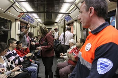Madrid subway inspectors checking tickets in 2011.