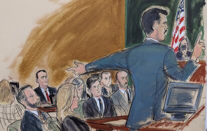 Assistant US Attorney Victor Zapana gives his opening statement while pointing to Hernan Lopez far left in red tie, in Brooklyn federal court, Tuesday, Jan. 17, 2023, in New York.