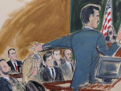 Assistant US Attorney Victor Zapana gives his opening statement while pointing to Hernan Lopez far left in red tie, in Brooklyn federal court, Tuesday, Jan. 17, 2023, in New York.