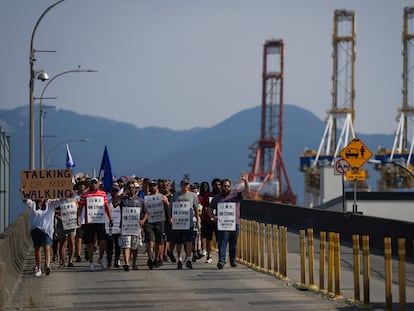 Striking workers protest at the port of Vancouver (Canada) on July 6.
