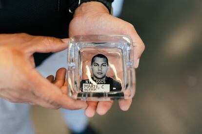 An ashtray showing Coss Marte's mugshot.