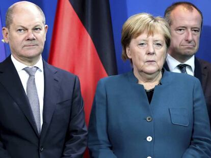 El ministro de Finanzas alemán, Olaf Scholz, junto a la canciller, Angela Merkel.