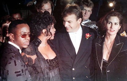Bobby Brown, Whitney Houston, Kevin Costner and his then-wife Cindy Costner at the premiere of 'The Bodyguard.'