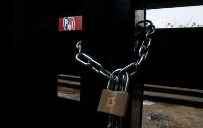 The doors of the headquarters of Mexico's Institutional Revolutionary Party, PRI, remain closed with chains in Mexico City, Wednesday, June 30, 2021