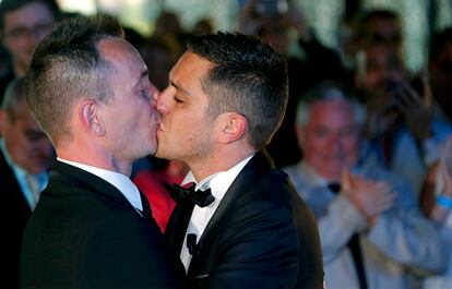 Autin and Boileau kiss during their wedding ceremony at the city hall in Montpellier