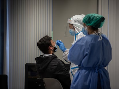 A man gets a PCR test in the Raval neighborhood of Barcelona on December 7.