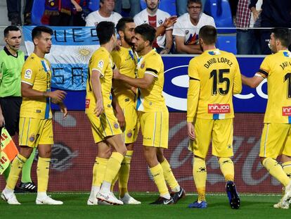 Los jugadores del Espanyol celebran uno de los goles de Borja Iglesias ante el Huesca.