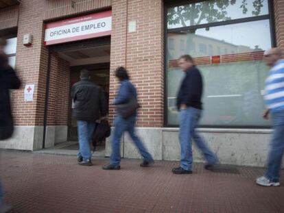 People entering an employment office in Madrid.