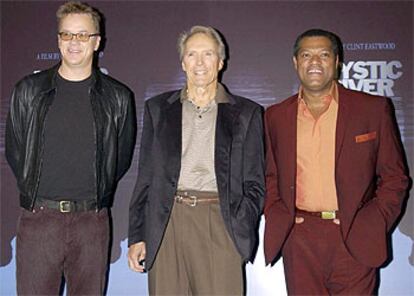 Tim Robbins, Clint Eastwood y Laurence Fishburne (de izquierda a derecha), ayer en Londres.