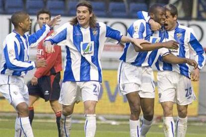 Romero, Miguel Ángel, Wanchope y Duda celebran uno de los goles del Málaga.